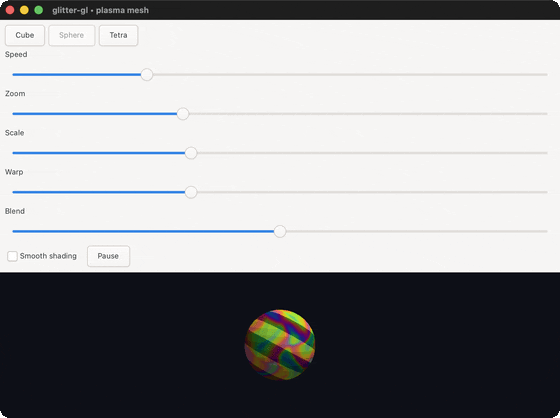 A sphere rotating under a composable plasma and gold-stripe shader; its high facet count makes the color read as a continuous gradient instead of flat panels